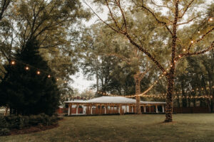 View of pavilion with trees and lights at Country Villa Weddings and Events.